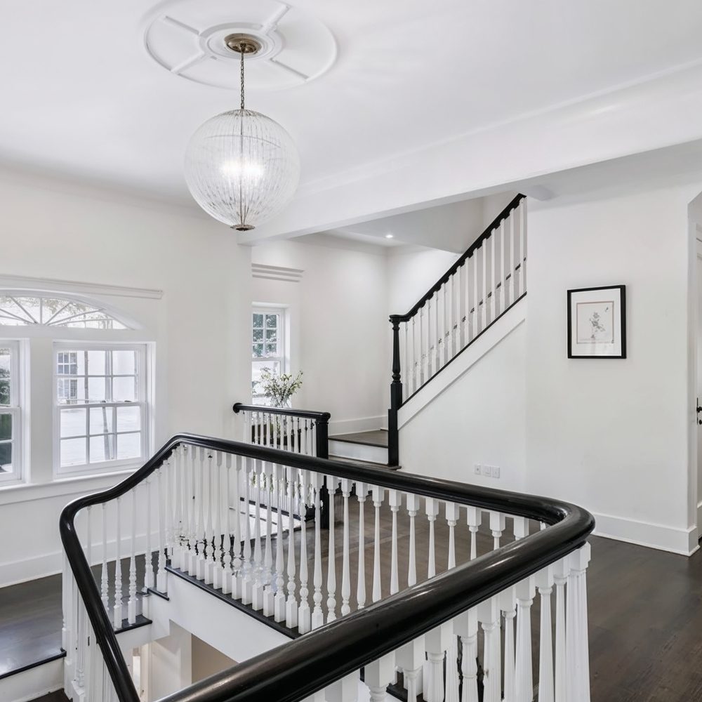 04 bright hallway with timeless stair railing