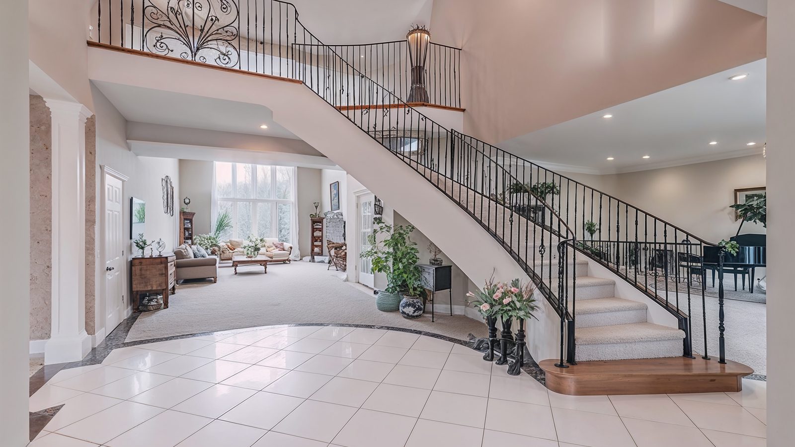 grand foyer with elegant staircase in pete hegseth%e2%80%99s hom
