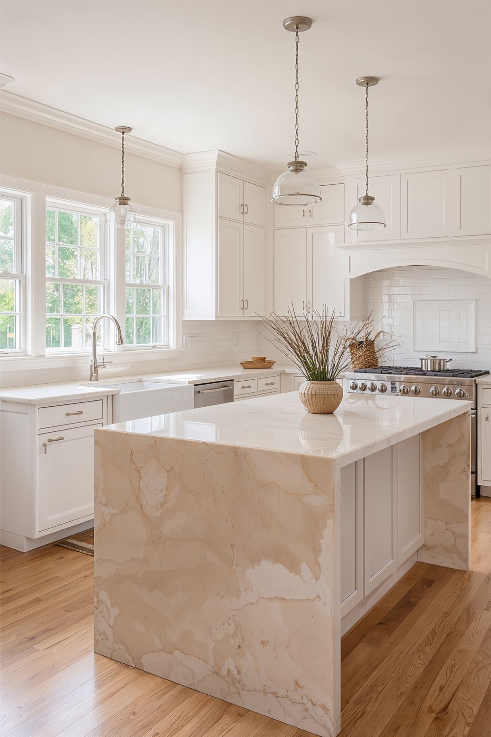Classic White Kitchen Cabinets With Taj Mahal Quartzite Countertops