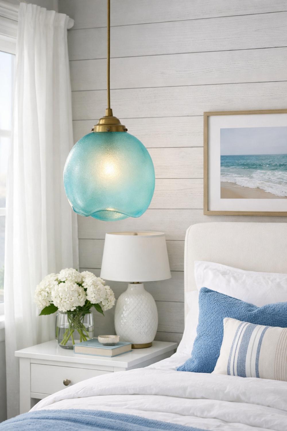 Sea Glass Pendant Light Above Coastal Bedroom Nightstand